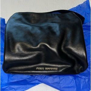 Black leather Juicy bag with satin lining and gold studs.